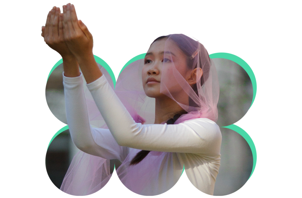 A cutout image of a dancer popping out of a fun, modern shape. She wears a pink veil-like headpiece, and is gesturing forward with both arms, hands cupped together.