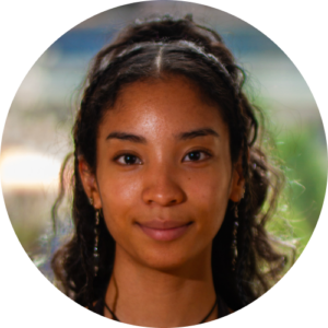 Headshot of Asia Yiu, Feld Repetiteur, smiling.