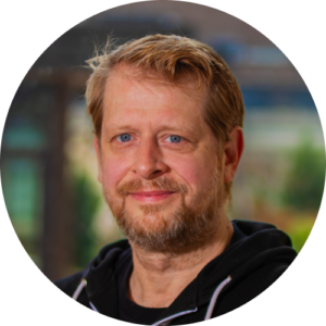 Headshot of Brian Reeder, Ballet teacher, smiling.