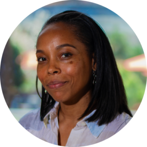 Headshot of Dionne Figgins, Artistic Director of Ballet Tech, smiling.