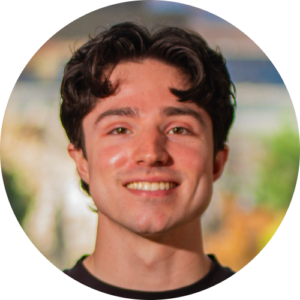 Headshot of Max Azaro, Ballet teacher, smiling.