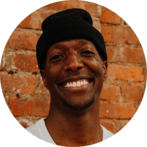 Headshot of Men Ca, Horton teacher, smiling.