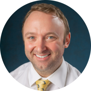 Headshot of Jared VanZweeden, Middle School ELA teacher, smiling.