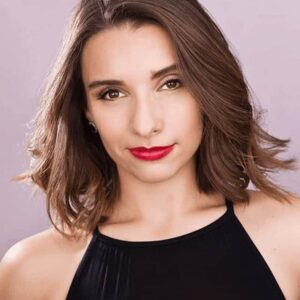 Headshot of Annastasia Confrey, Jazz Instructor, looking straight at the camera.